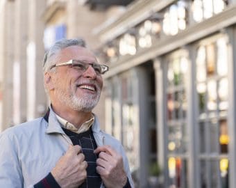 Medium shot happy old man outdoors