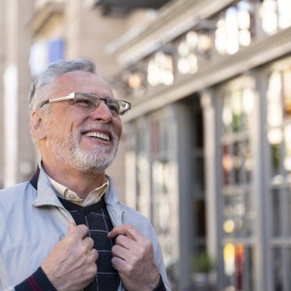 Medium shot happy old man outdoors