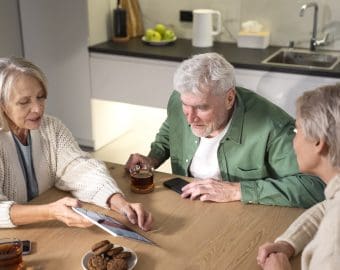Close up senior people with tablet