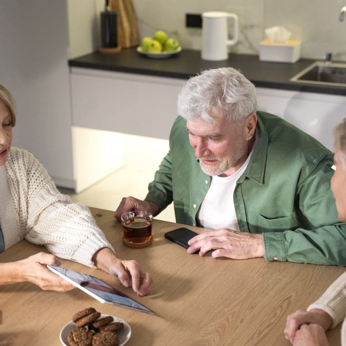 Close up senior people with tablet