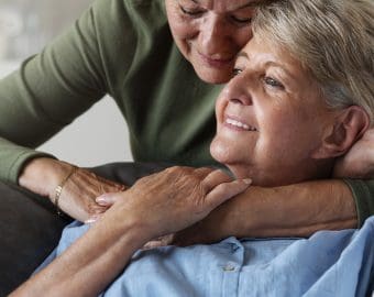 Happy queer eldery couple side view
